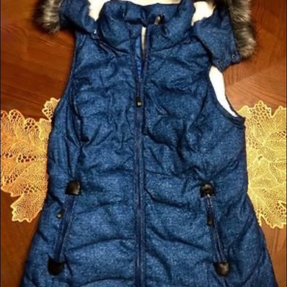 NWOT Soft and plush blue vest. Size S. Never worn!